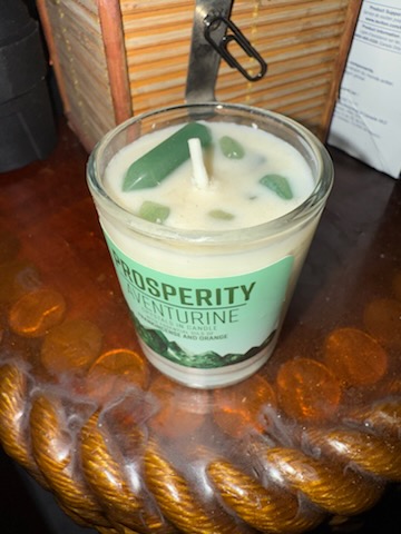 A candle in a glass jar from Haven’s product collection